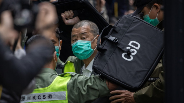 Хонконгският медиен магнат Джими Лай и още двама активисти бяха