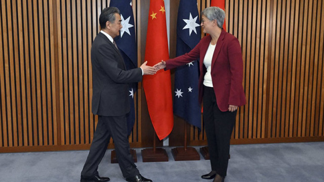 Затопляне между Китай и Австралия със знакова среща в Канбера
