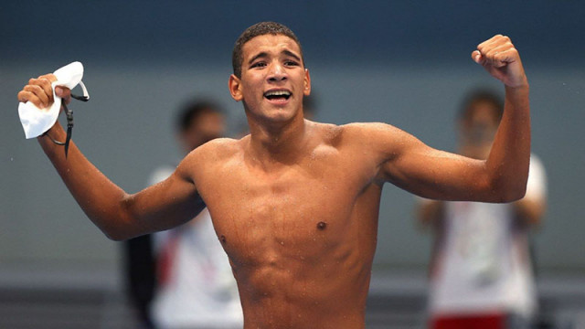 Един от олимпийските герои на Африка плувецът Ахмед Хафнауи който