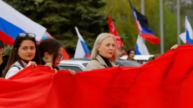 "Нашият Путин ще донесе мир": Настроенията в Донецк преди преговорите между Русия и Украйна